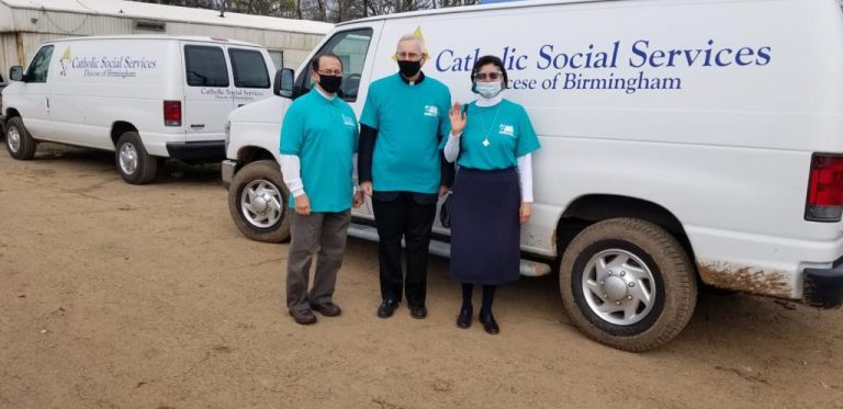 Bishop Steven J. Raica visiting families affected by the Tornado