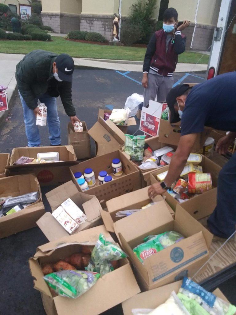 La Casita distributing food in Albertville, AL.